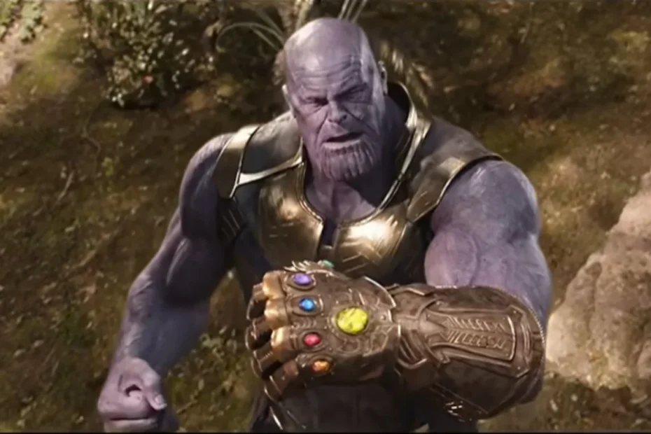 Camp Snap camera Thanos snap hand wearing Infinity Gauntlet with dust particles and purple glow